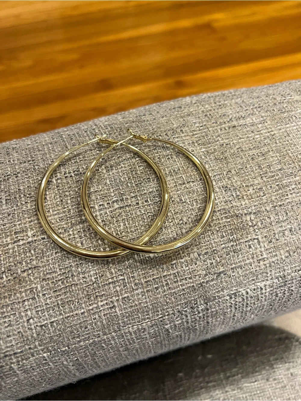 70mm gold-tone hoop earrings.